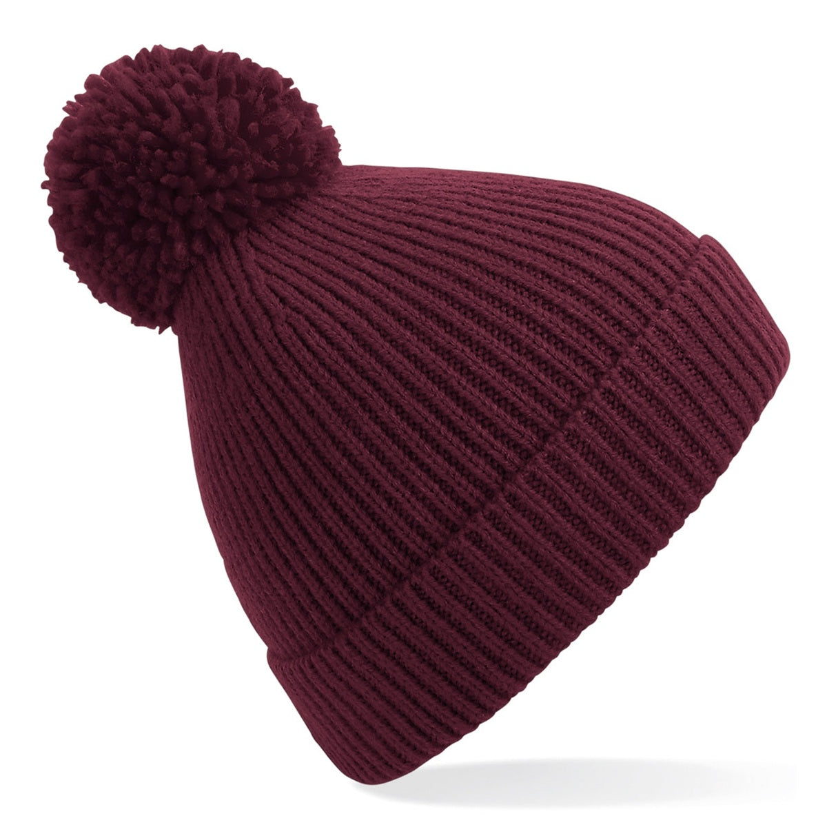 Engineered knit ribbed pom pom beanie