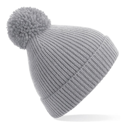 Engineered knit ribbed pom pom beanie
