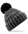 Twist-knit pom pom beanie